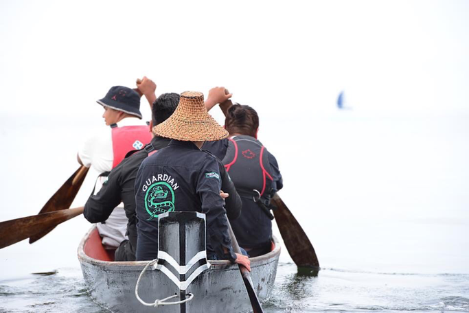Tribal Park Guardian Joe Martin paddles his caaputs (dugout canoe)